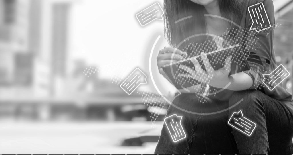 consultant working on tablet outside