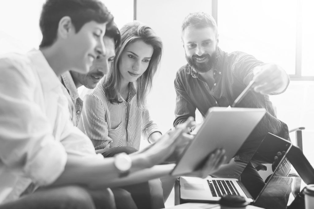 group of professional consultants working in office