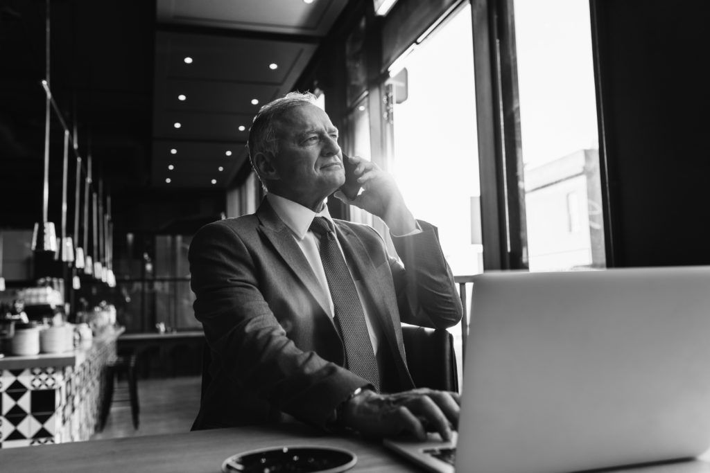 consultant talking on phone at restaurant