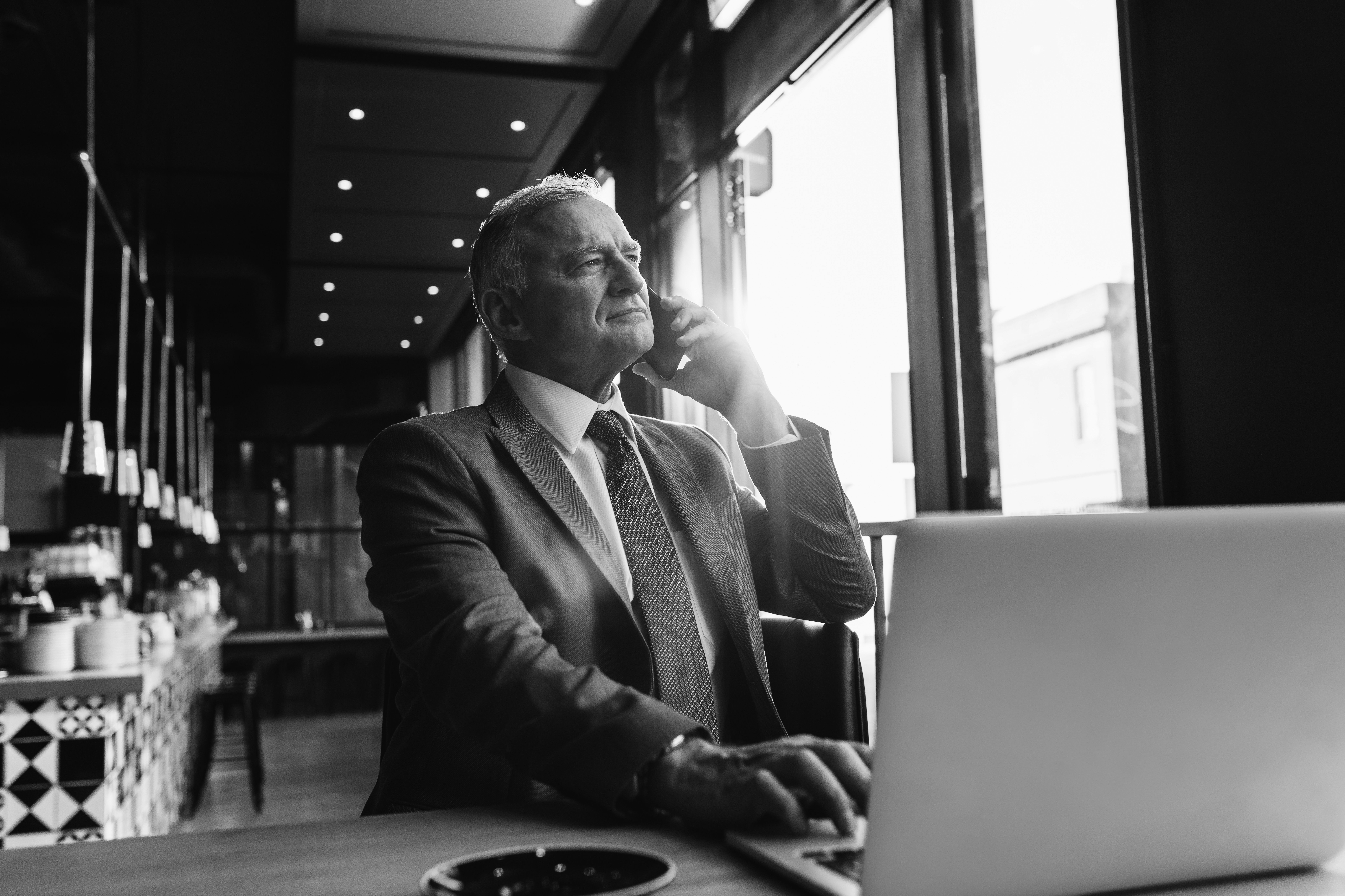consultant talking on phone at restaurant