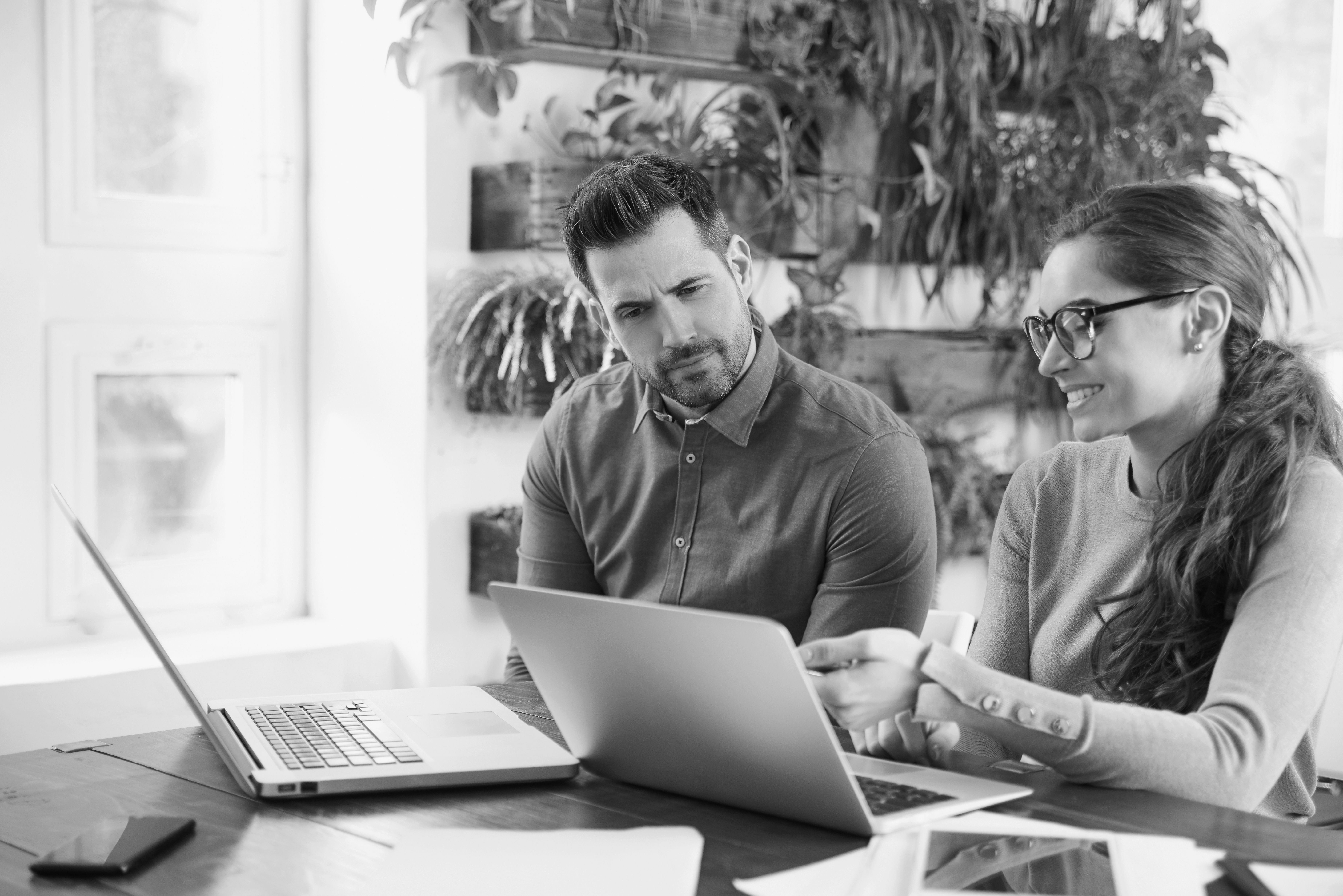 consultants looking at laptop