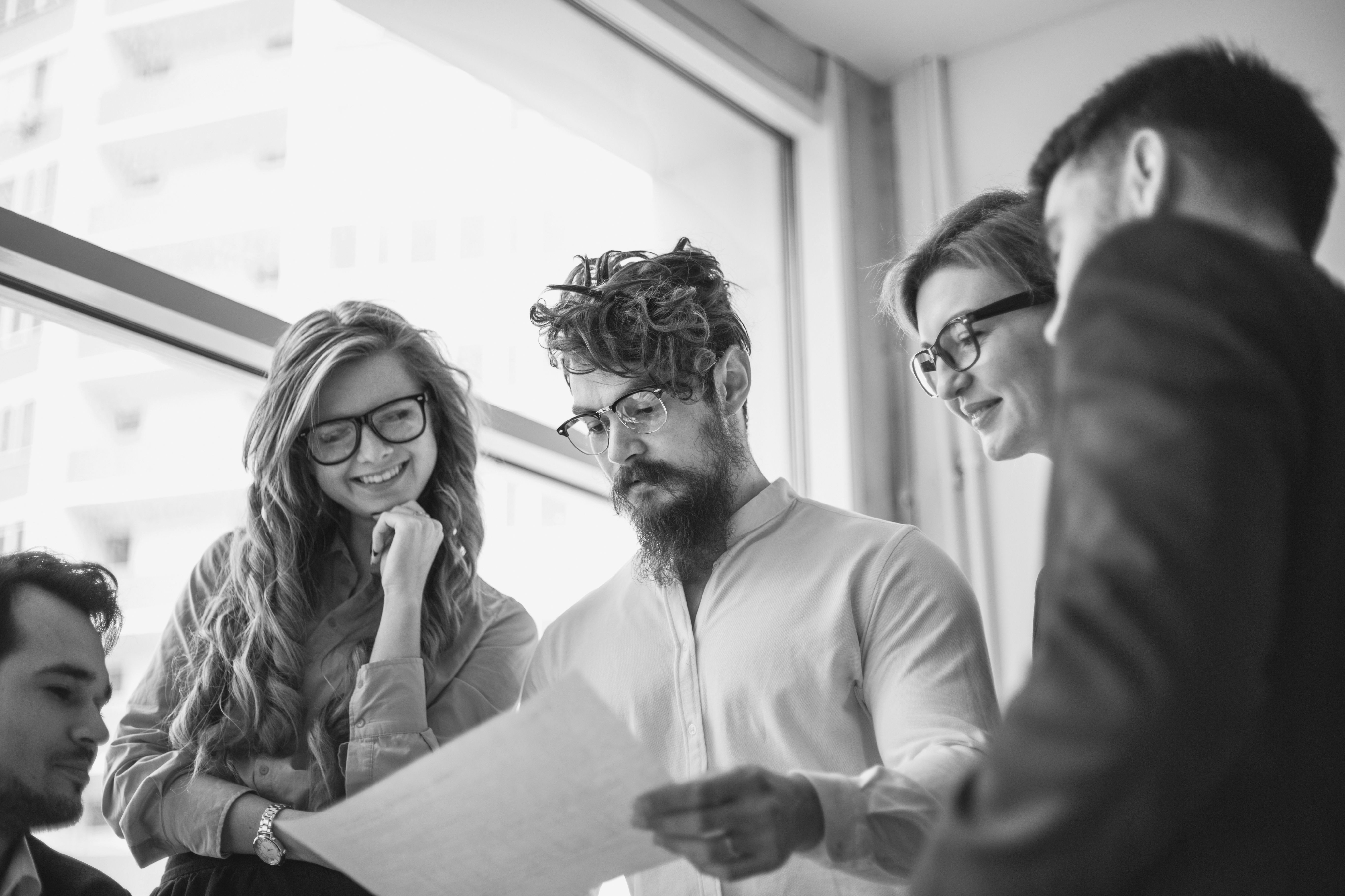 group of professional consultants working in office
