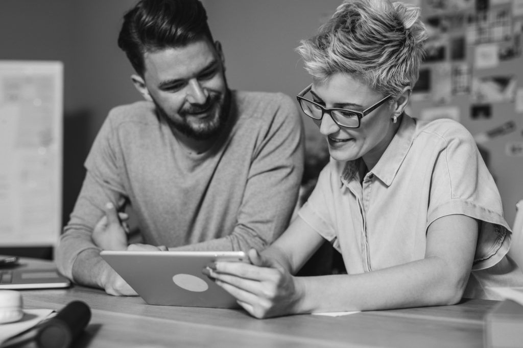 consultants working on laptop