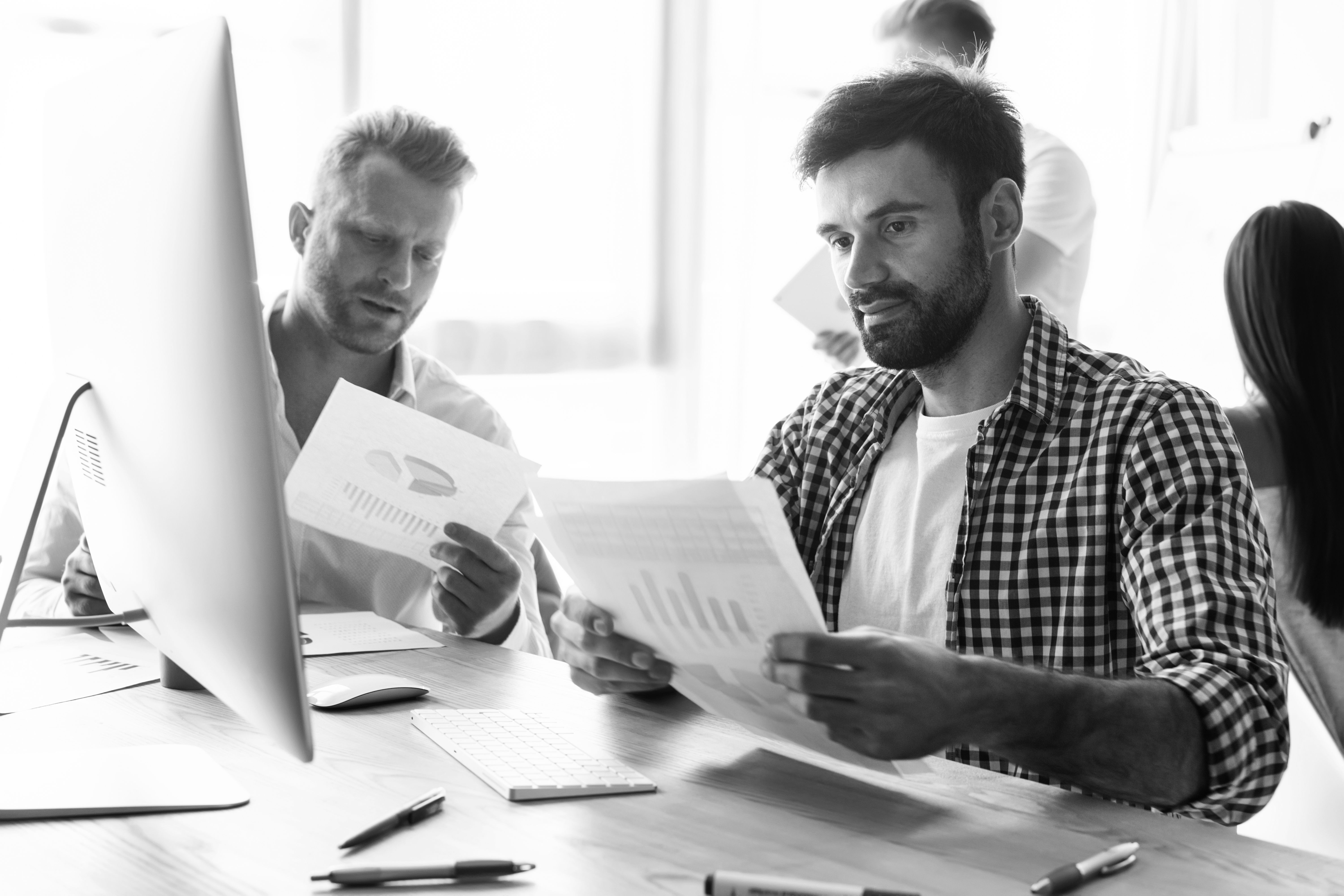 consultants looking at charts