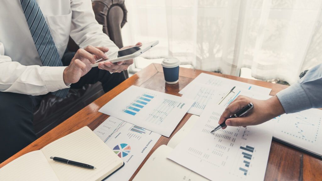 Independent consultant working on paperwork.