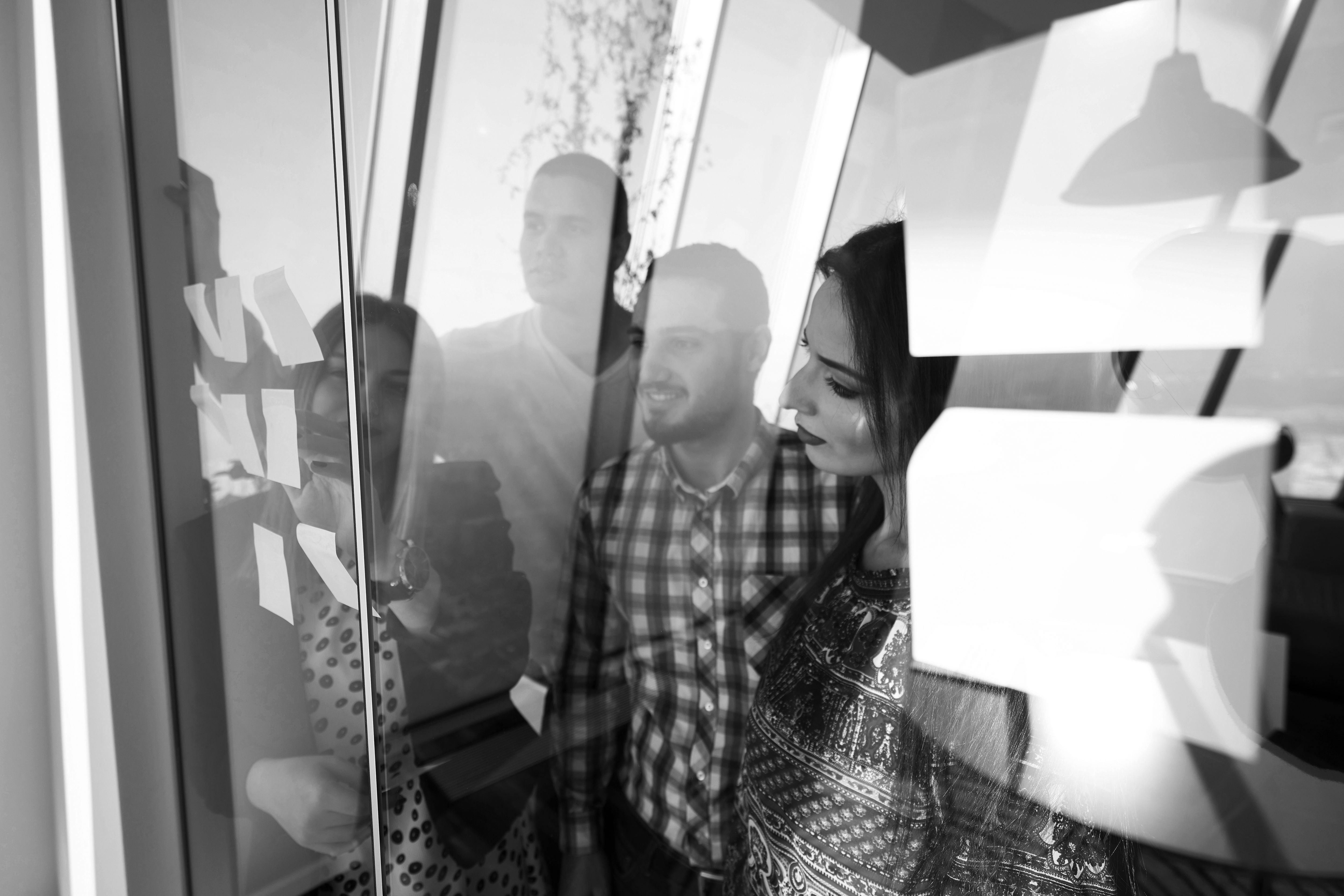 consultants writing on post its