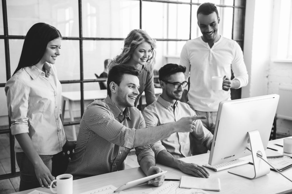 people looking at computer