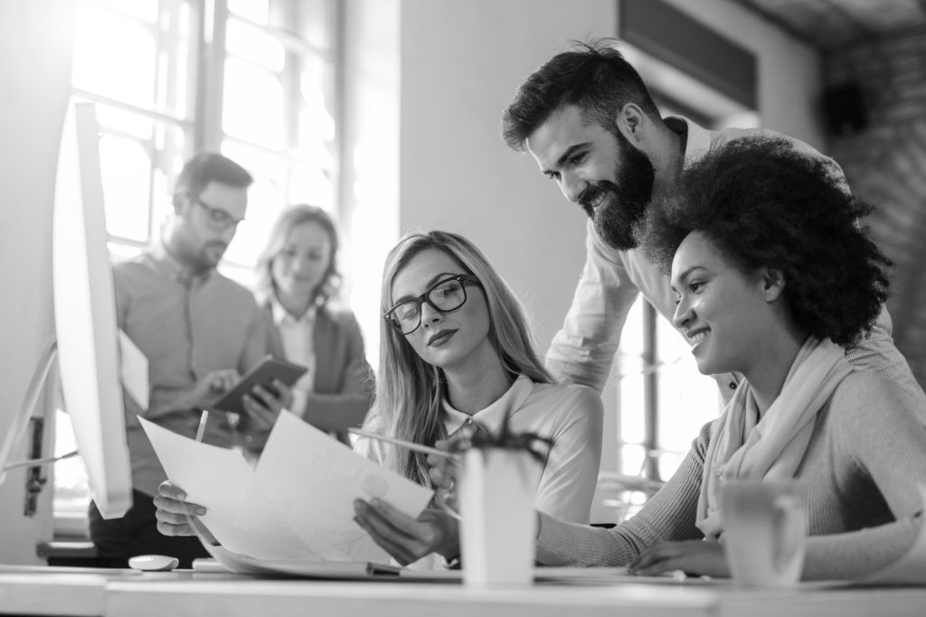 group of professional consultants working in office