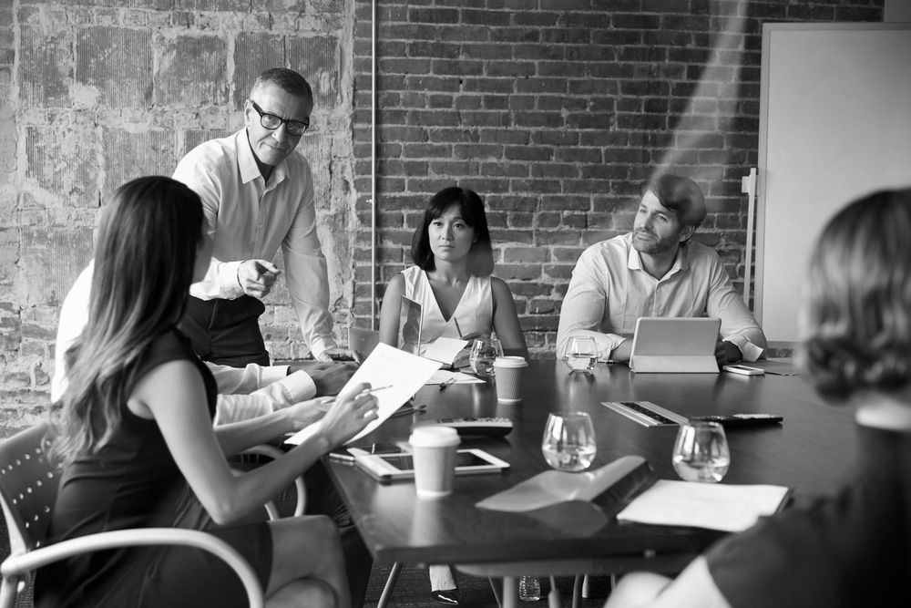 people talking at a table